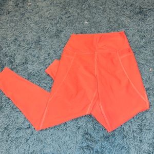 shimmery orange/peach leggings with pockets